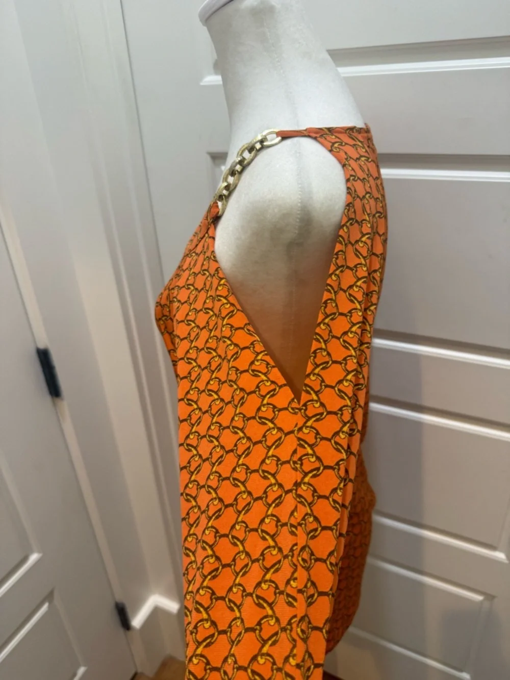 Michael Kors. Cold Shoulder Orange Chain Blouse. Size Small.